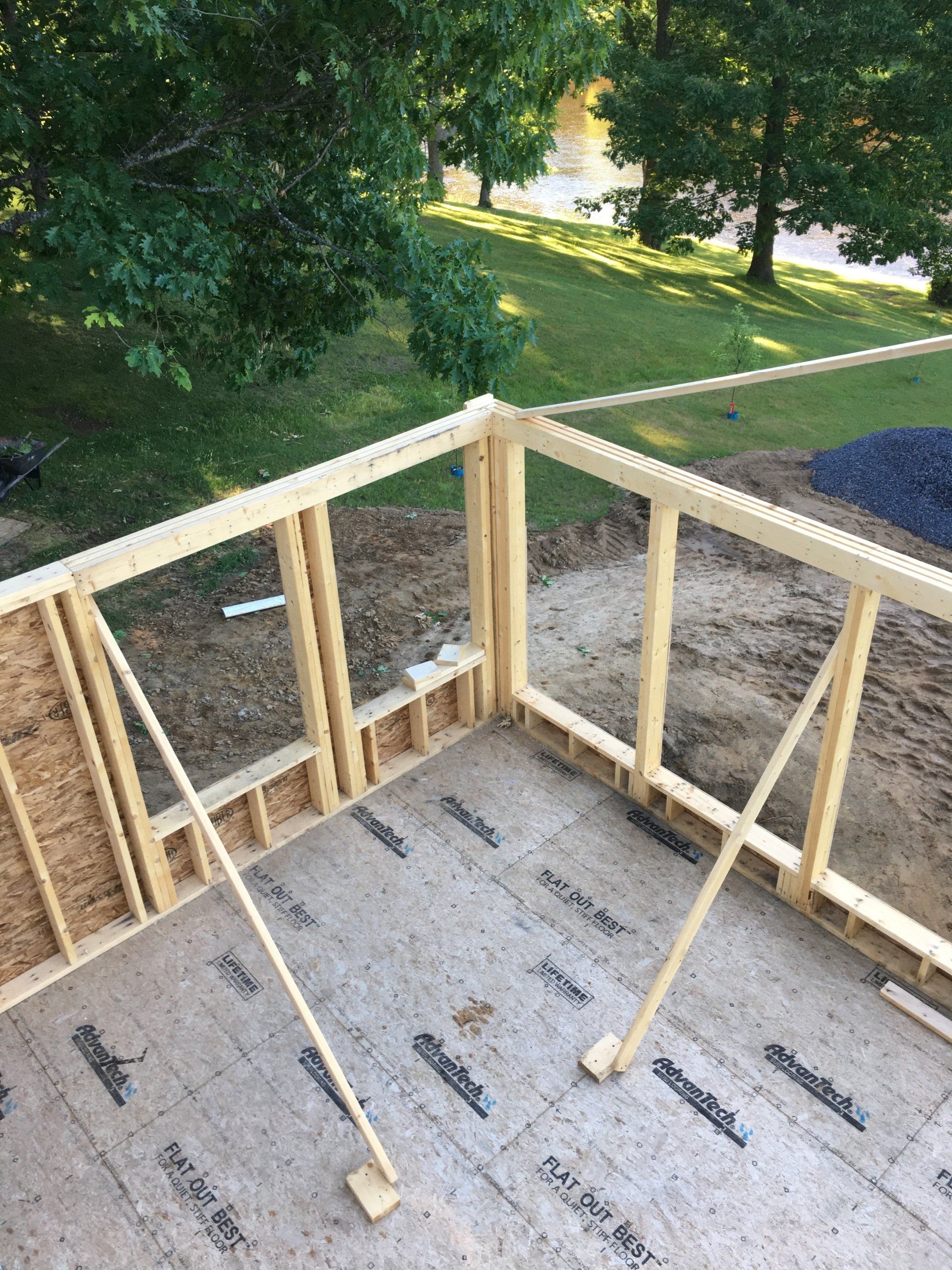 An aerial view of a wooden deck under construction.