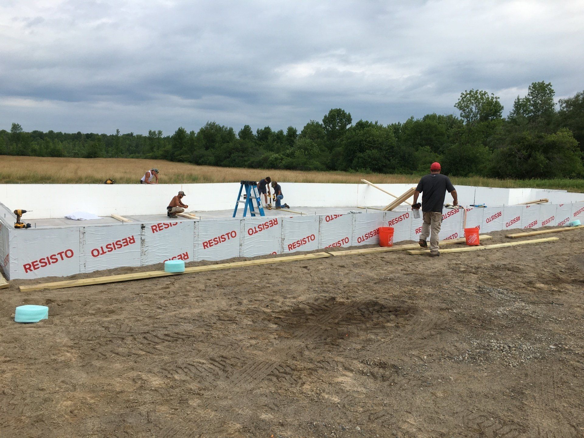 A group of people are working on a construction site.