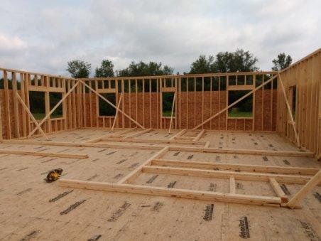 A house is being built with a lot of wood