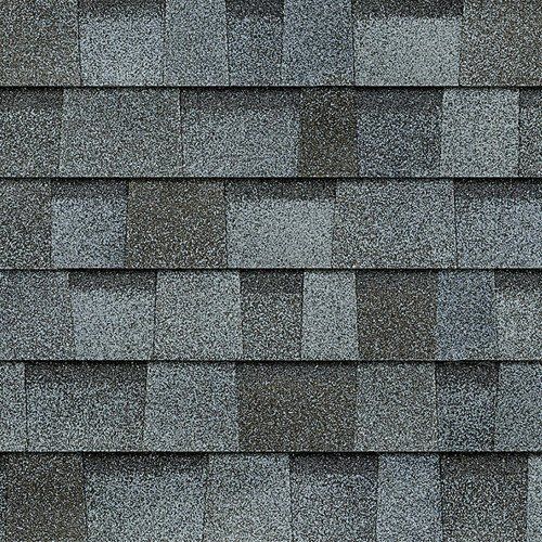 A close up of a row of shingles on a roof.