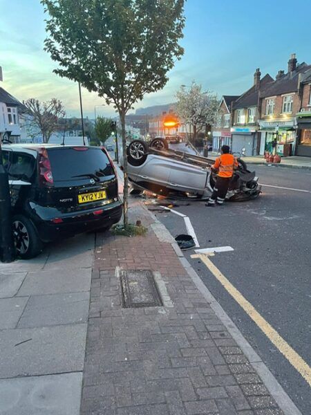 A car that has a license plate that says ecv62