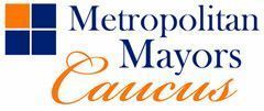 The logo for the metropolitan mayors caucus is blue and orange.