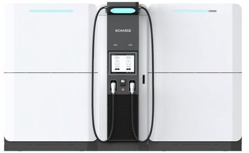A white and black machine with a charger attached to it.
