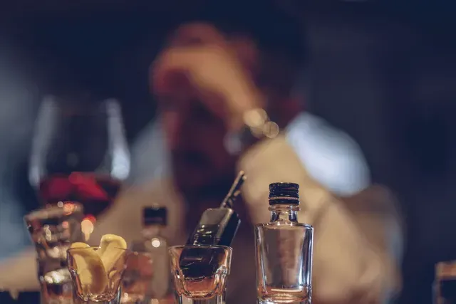 A Man Is Sitting At A Table — Pleasanton, CA — Thompson • Garcia Law