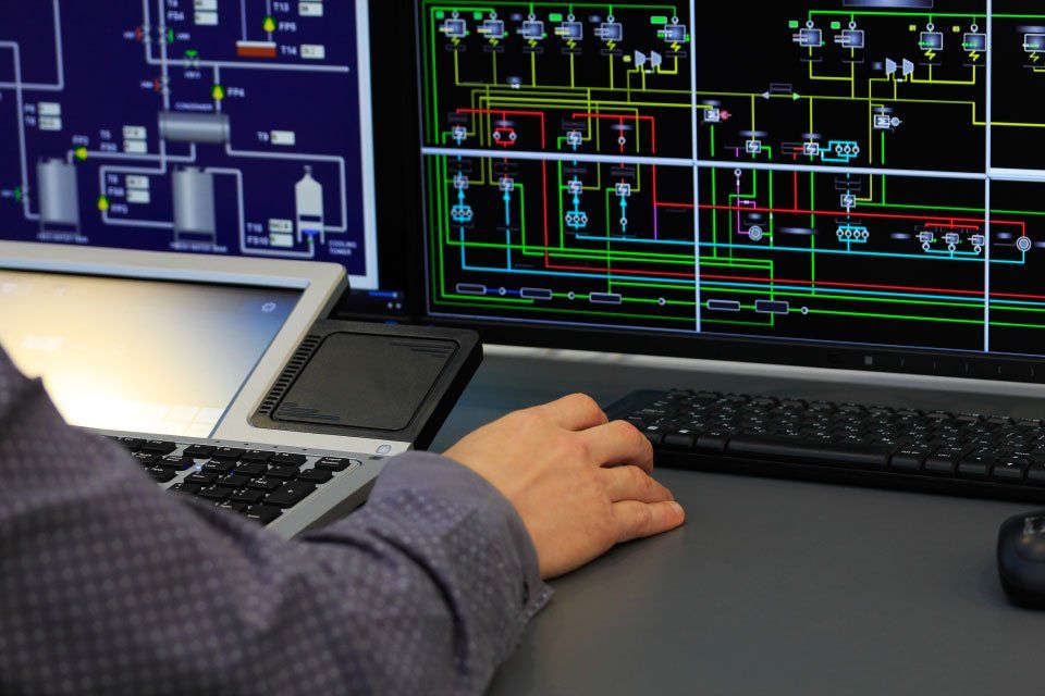 man controlling system using a computer