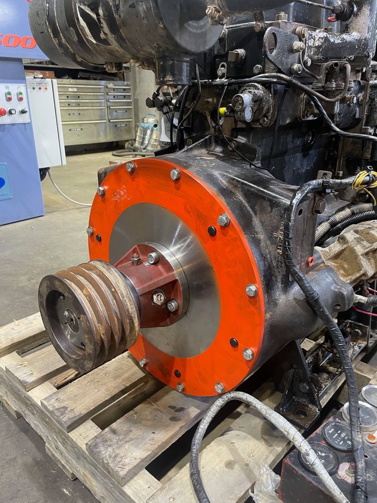 A Large Engine Is Sitting On Top Of A Wooden Pallet — McLaren Engineering in Atherton, QLD