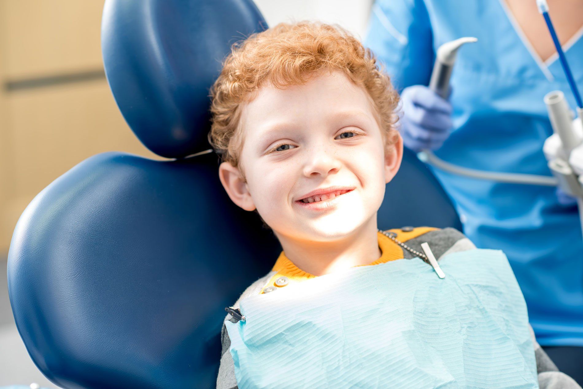 child with NC medicaid smiling at the dentist