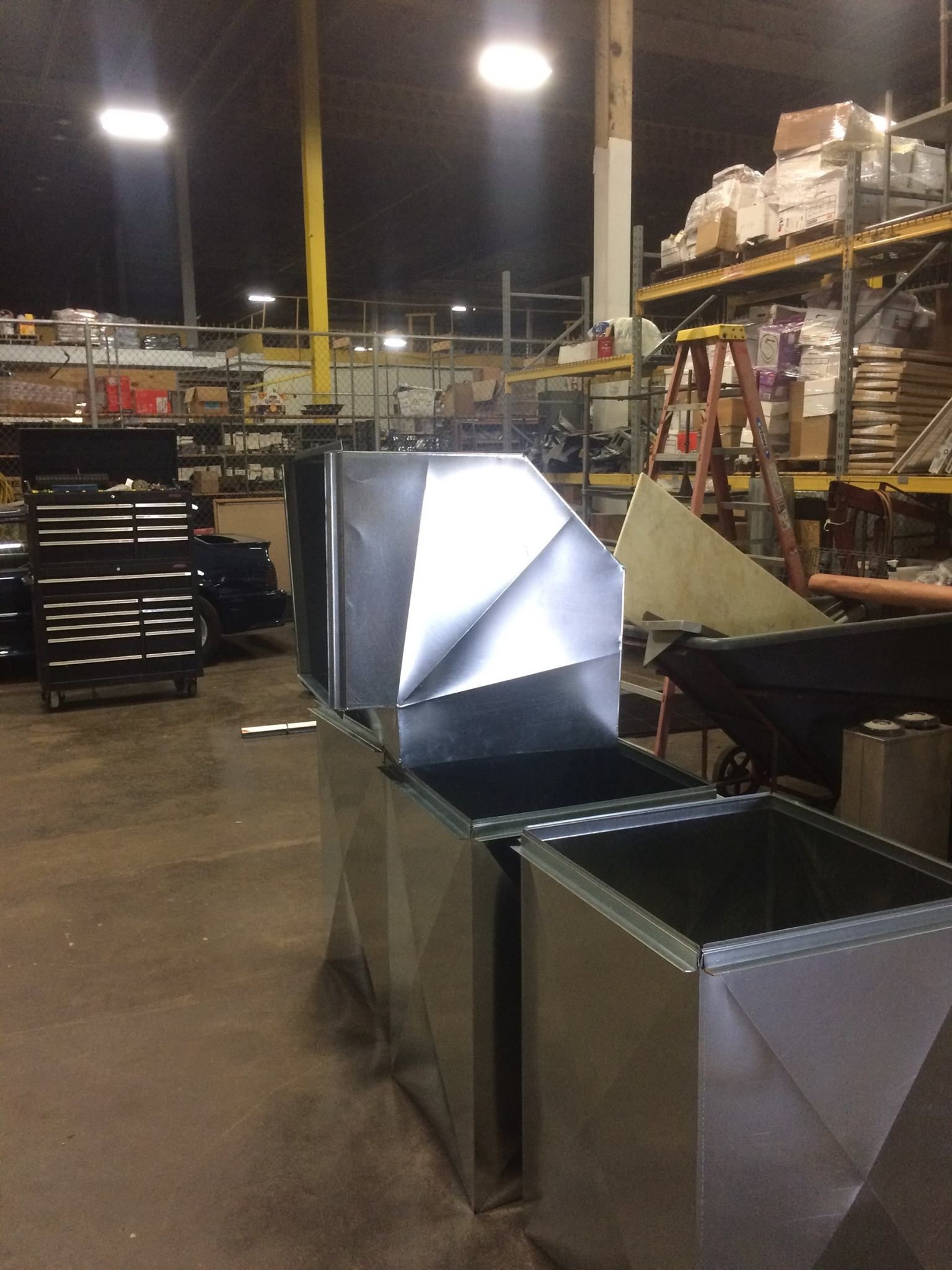 A close up of a metal roof with screws on it.