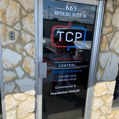 A door with a sign that says tcp on it