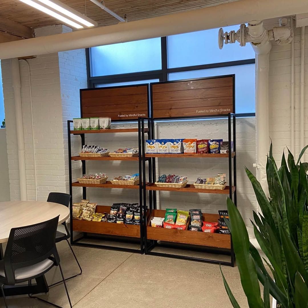 A snack rack of healthy snacks at a high end office