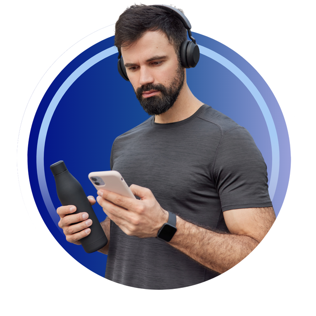 Man wearing headphones, looking at his phone, holding a water bottle, set against a blue gradient circle.