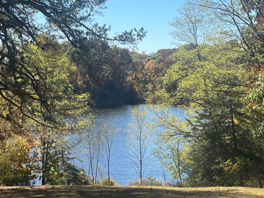 A silhouette of a man without a face on a white background.