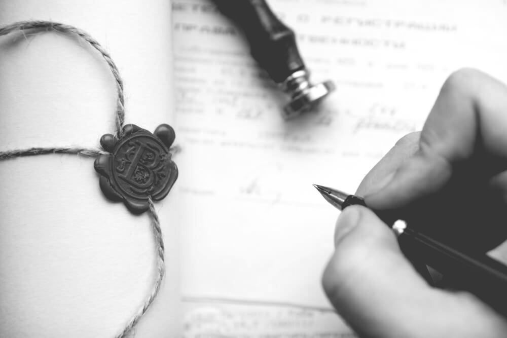 Notary's Public Pen And Stamp On Testament And Last Will — Farrell Lusher Solicitors In Wagga Wagga, NSW