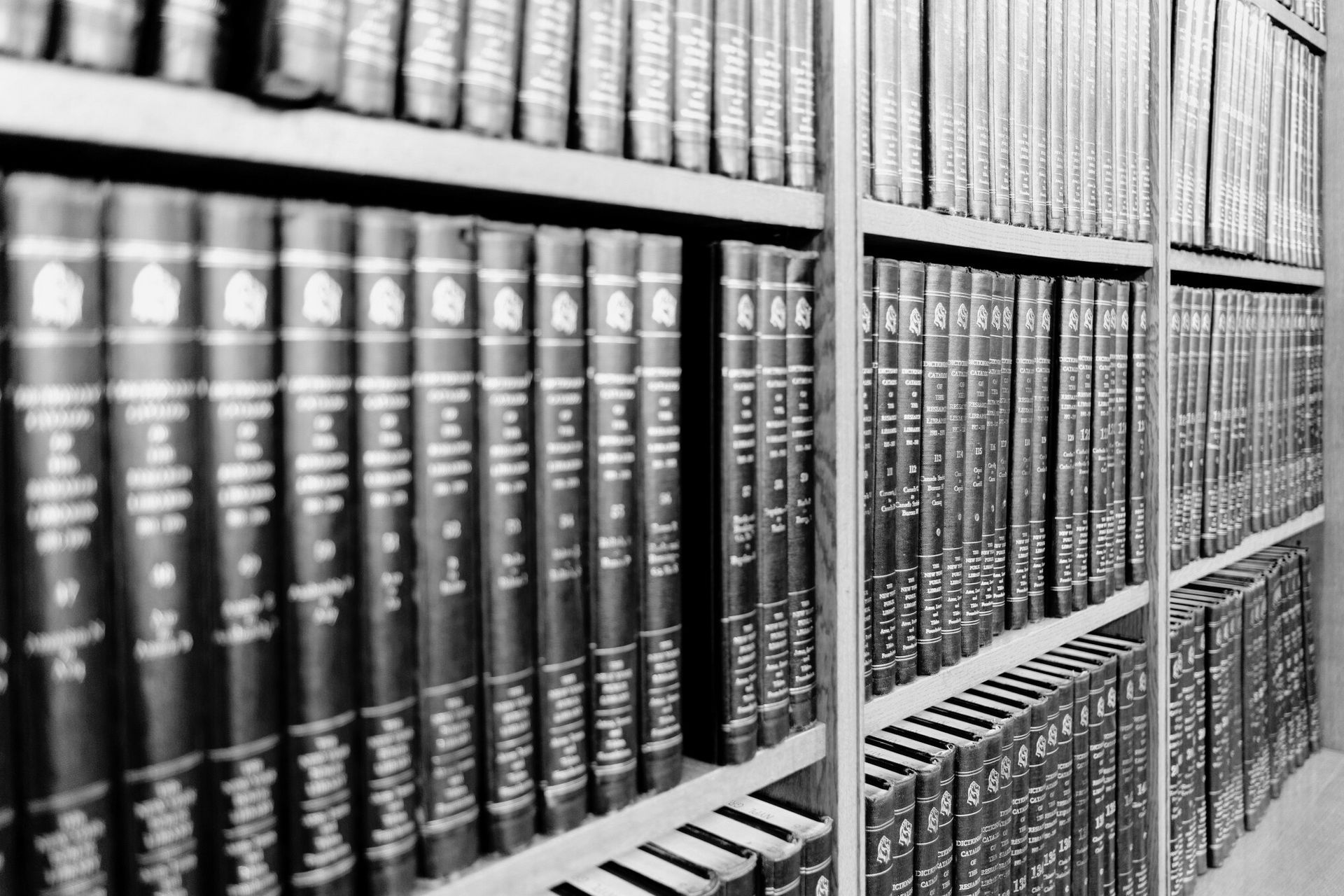 A Row Of Books On A Shelf Each Having Different Number On It — Conveyancing in Wagga Wagga