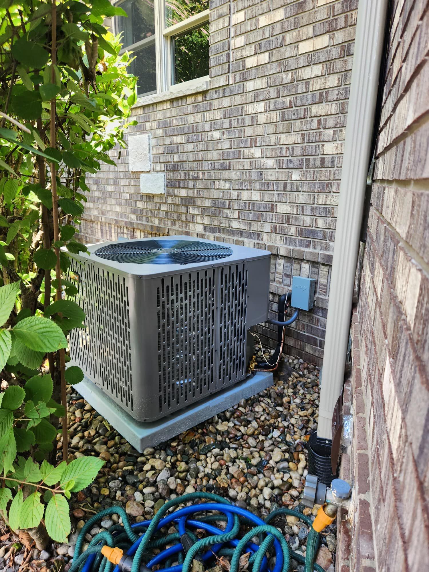 A wooden fence with a gate attached to it.