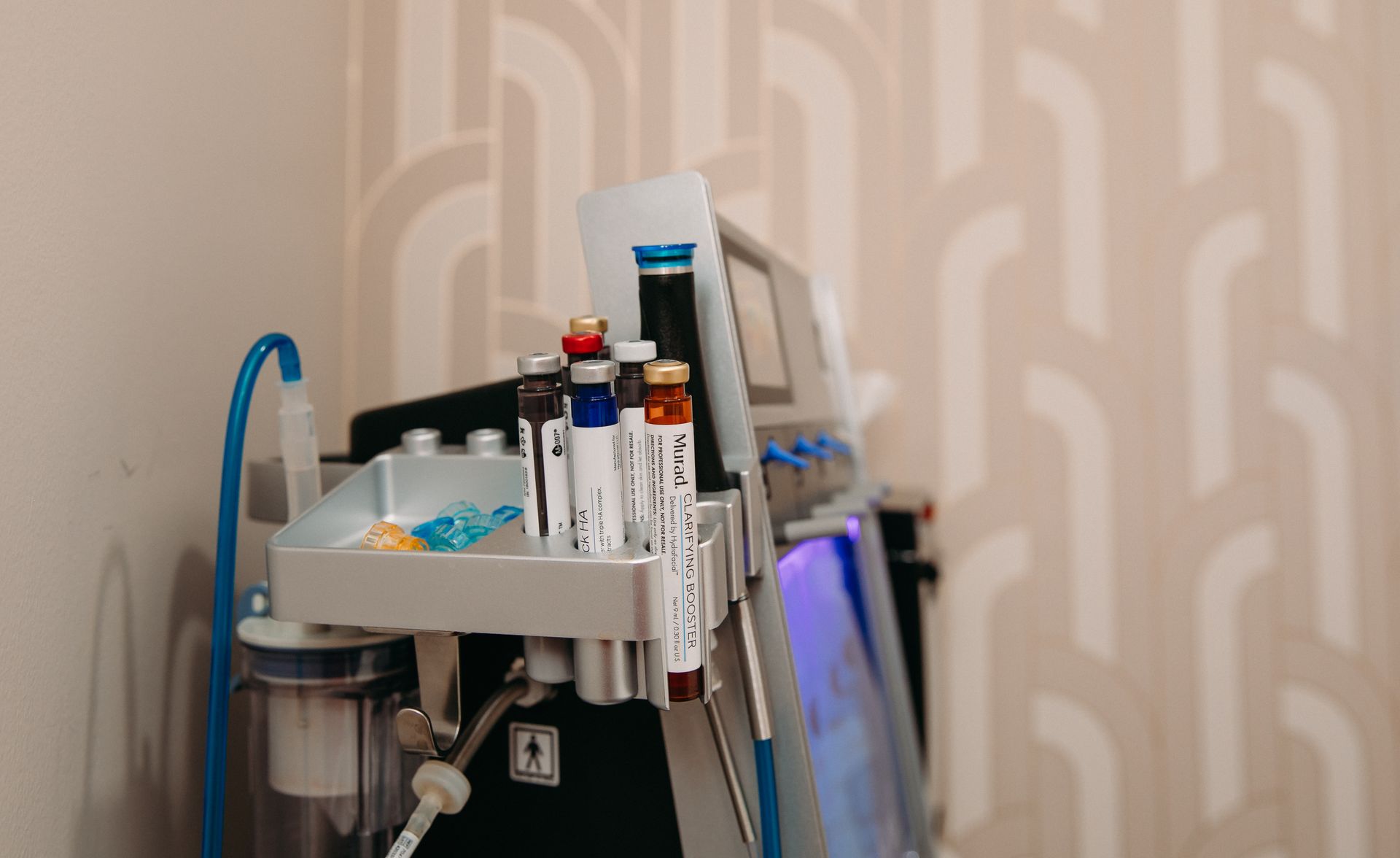 A machine with a bunch of tubes on it in a room.