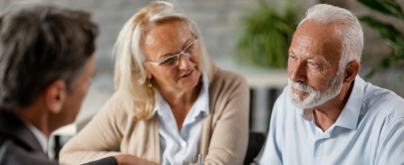 Older lady and Gentleman sitting next to each other