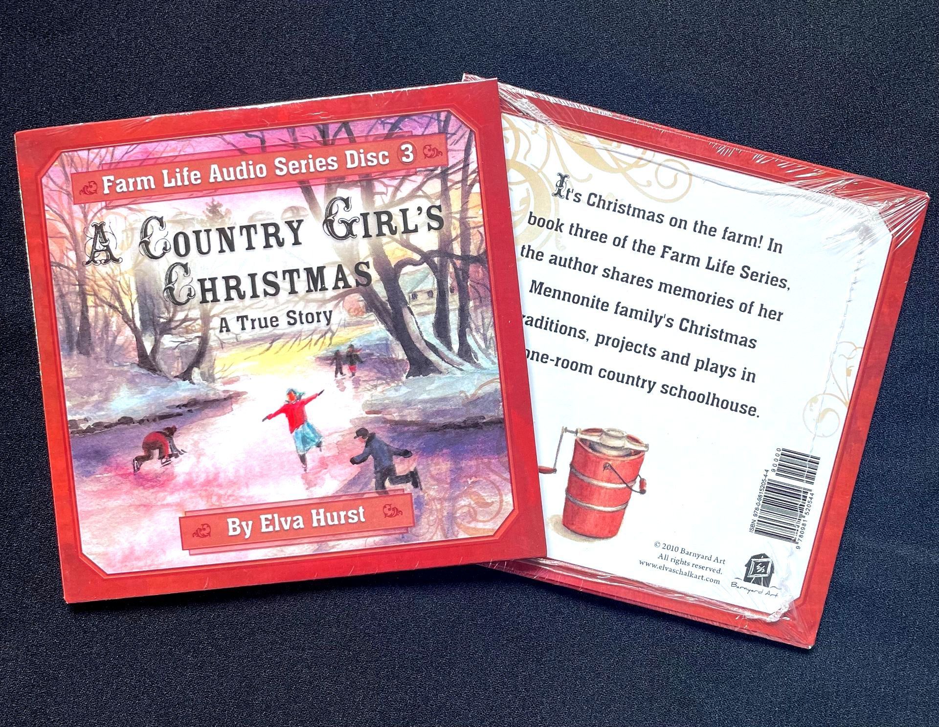 A book called a country girl 's christmas is sitting on a table.