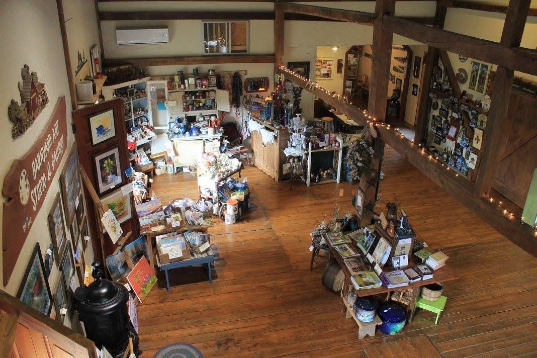 An aerial view of a room filled with lots of furniture.