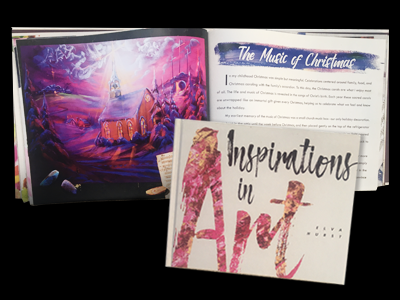 A book titled inspirations in art is sitting next to a book titled the magic of christmas.