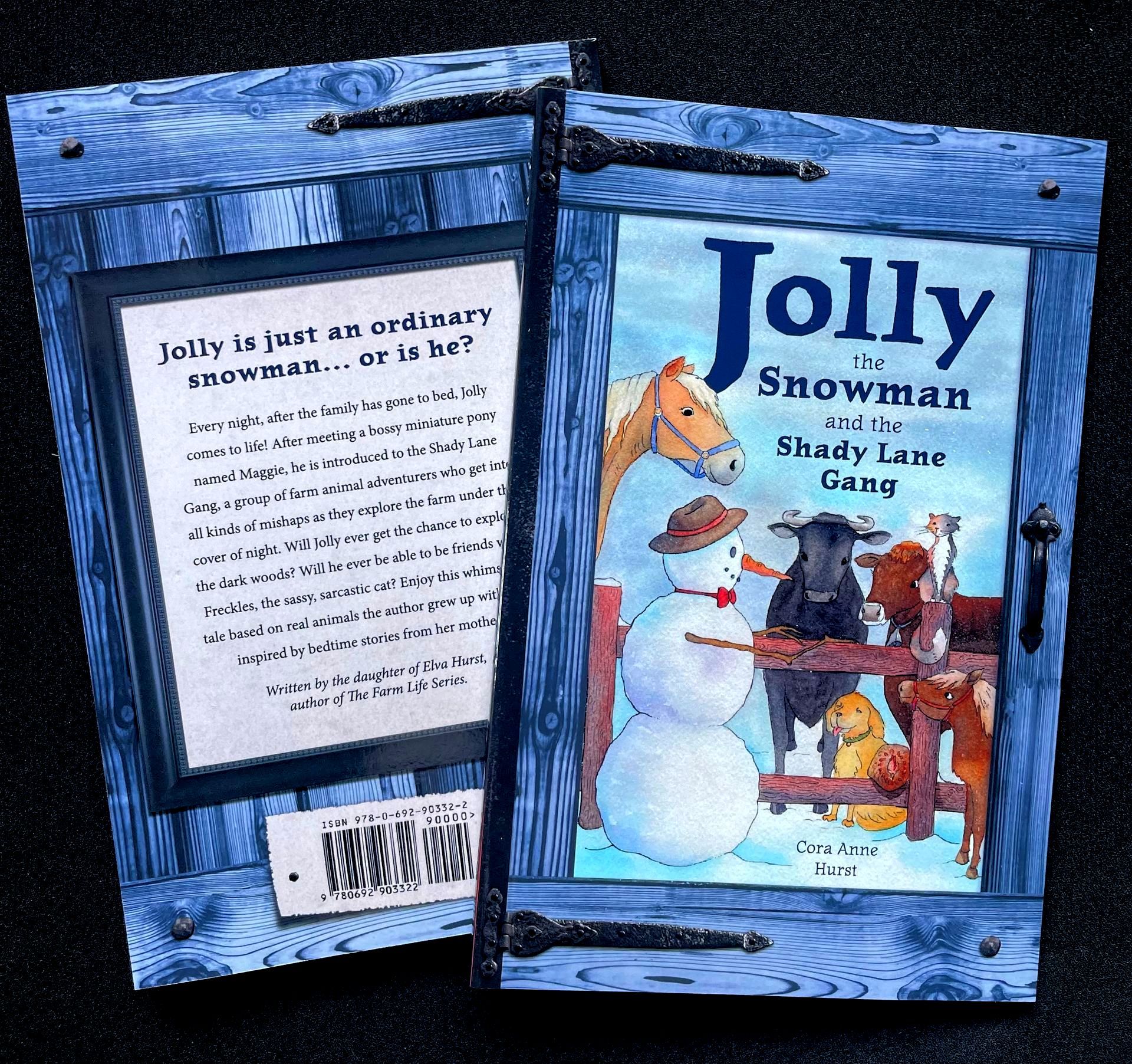 A book called jolly the snowman is sitting on a table