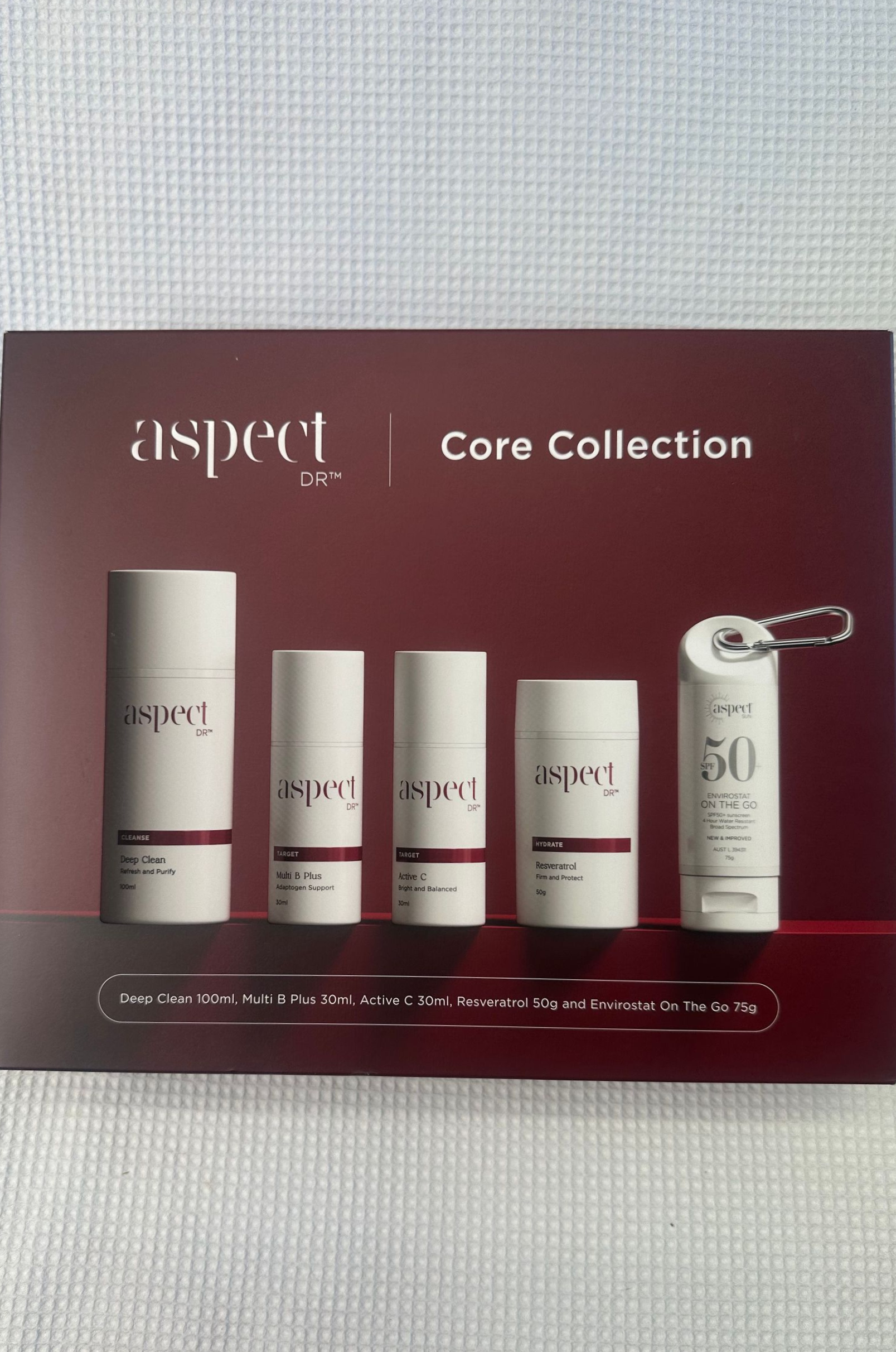 A Person is Pouring a Glass of Wine From a Box on a Table — Renew Laser Clinic in Taree, NSW