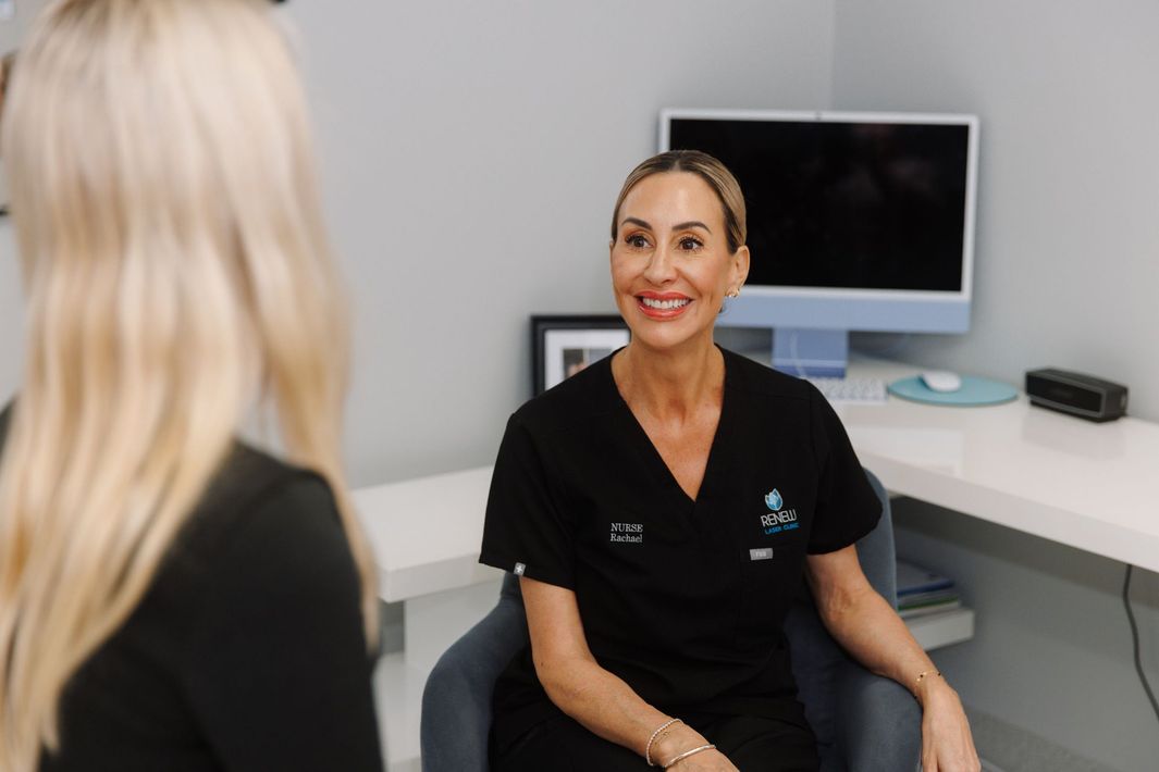 A Woman With a Black Mask on Her Face is Getting a Treatment — Renew Laser Clinic in Taree, NSW