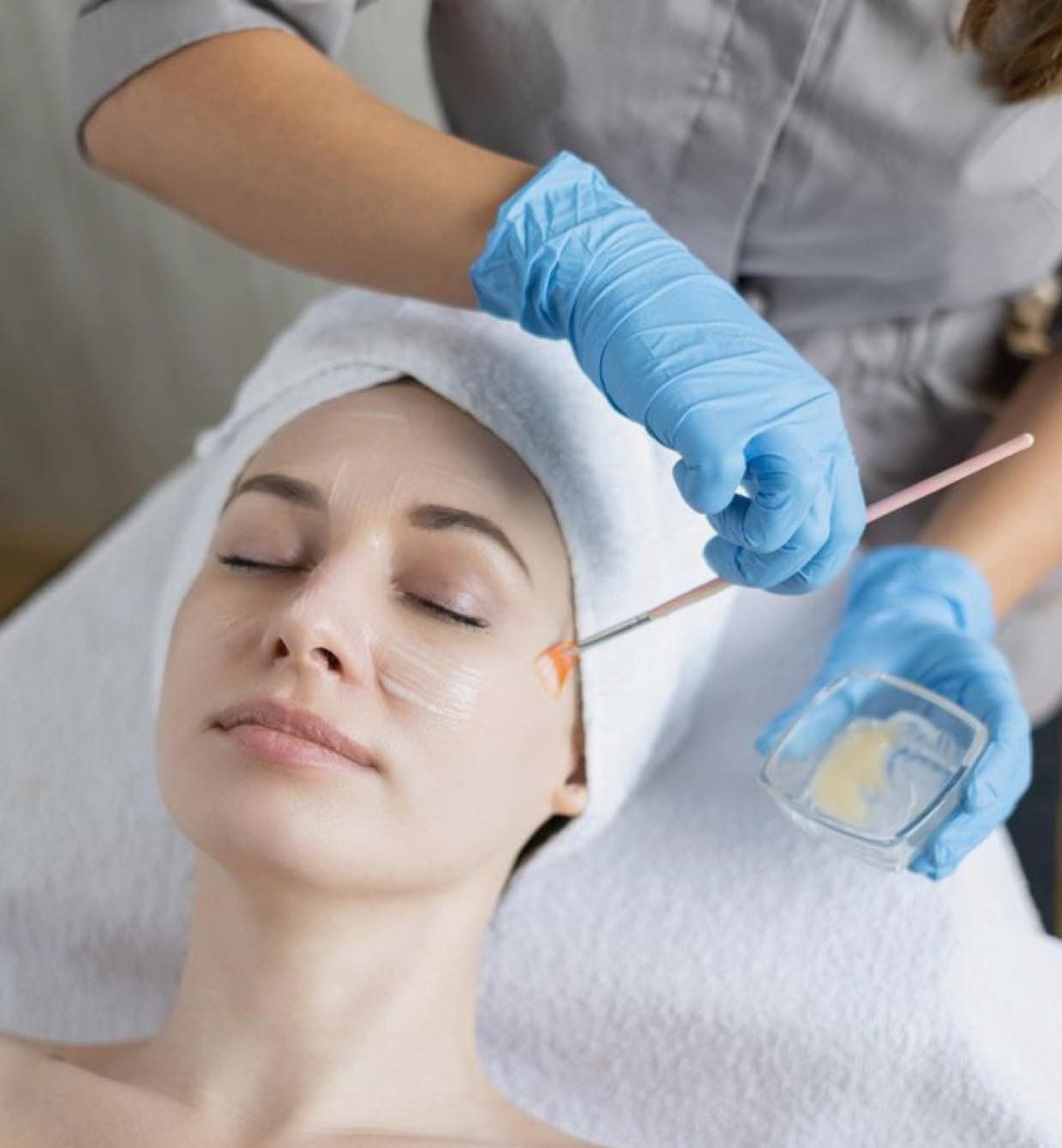 Woman Getting Facial Treatment