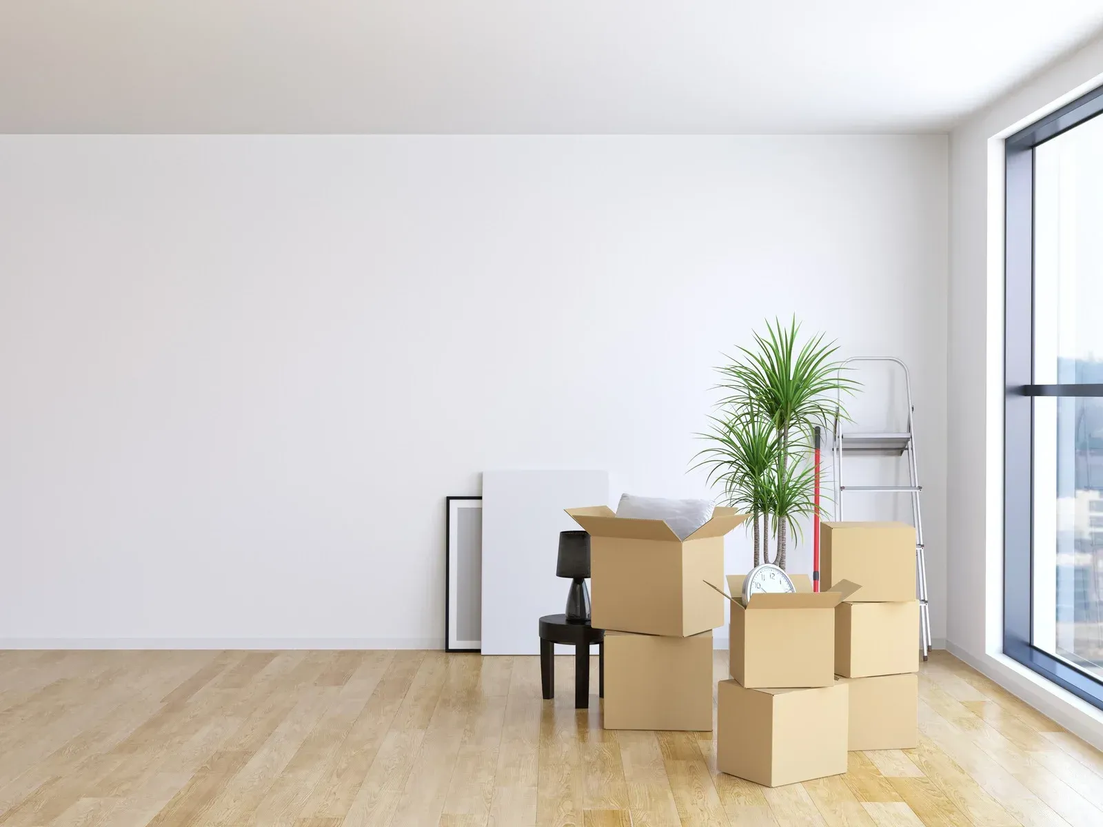 There are a lot of cardboard boxes in the room.