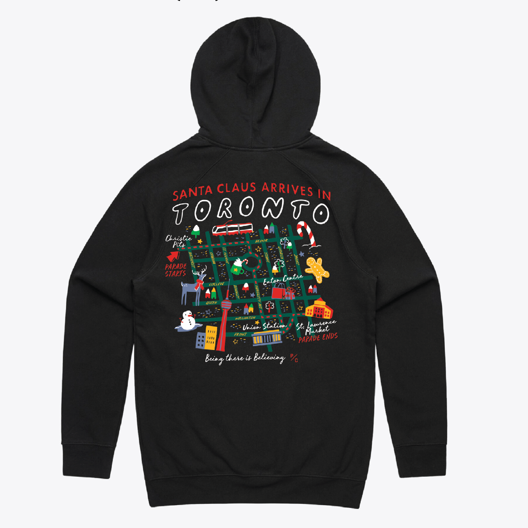 A black sweatshirt with the Santa Claus Parade map on the back.