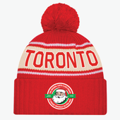 A red toque with the Santa Claus Parade logo on it.