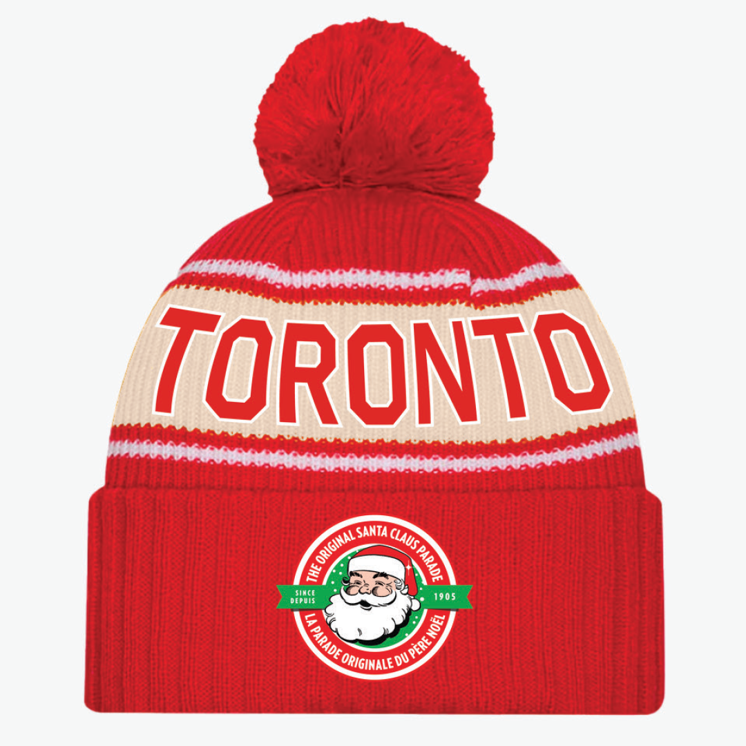 A red toque with the Santa Claus Parade logo on it.