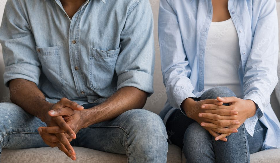 Gavel and Lady Justice statue next to wooden blocks spelling Gavel and Lady Justice statue next to wooden blocks spelling