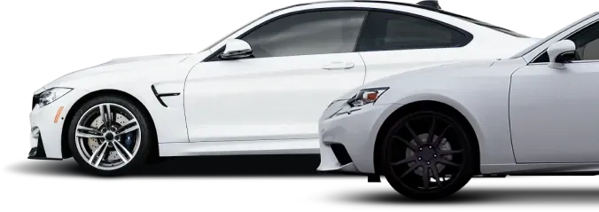 Three white cars parked | Mariposa Tire & Auto