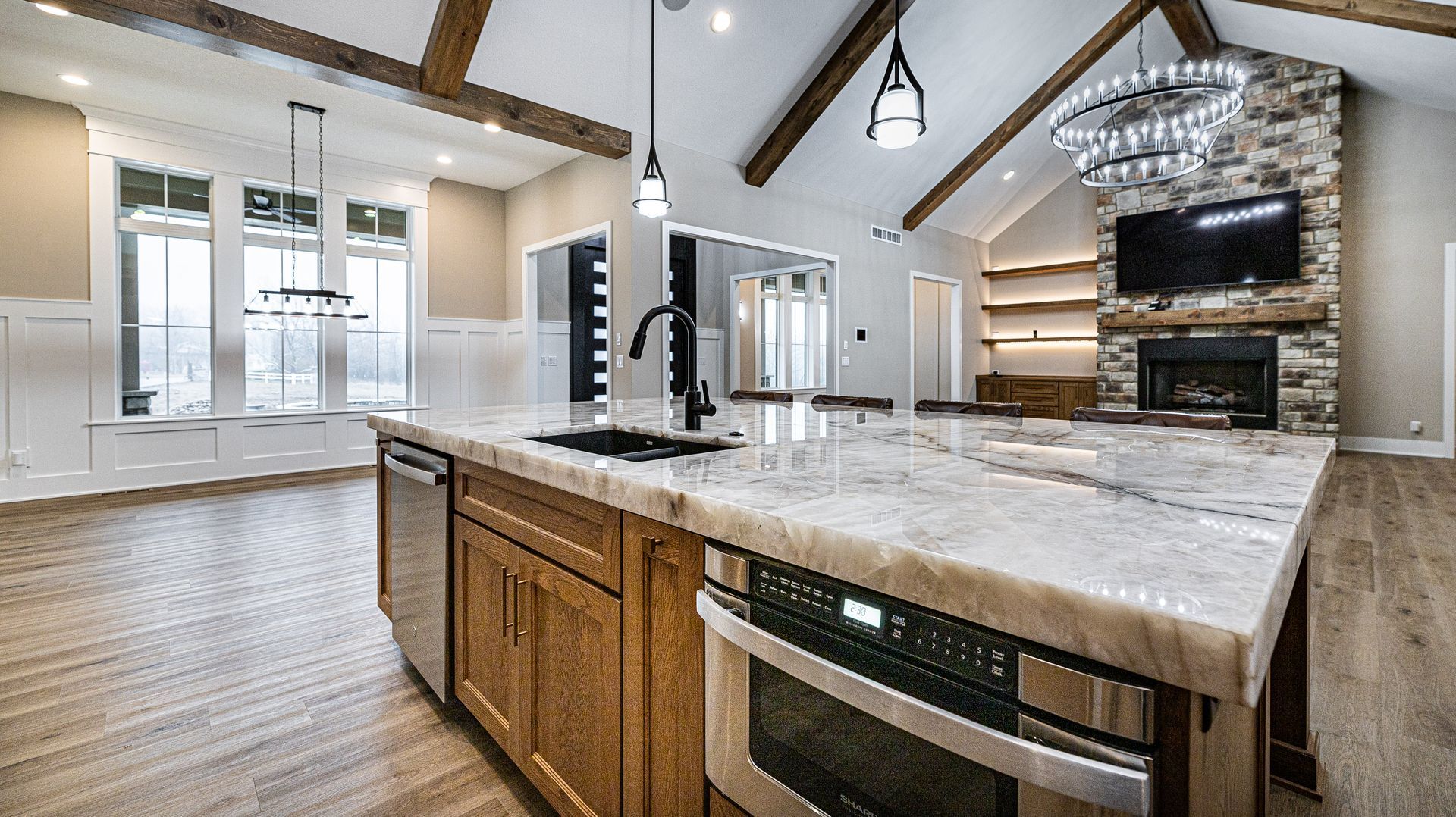 There is a large island in the middle of the kitchen.