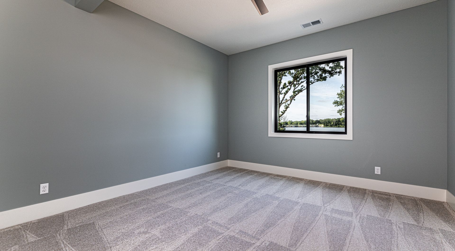 There is a large window in the middle of the room.