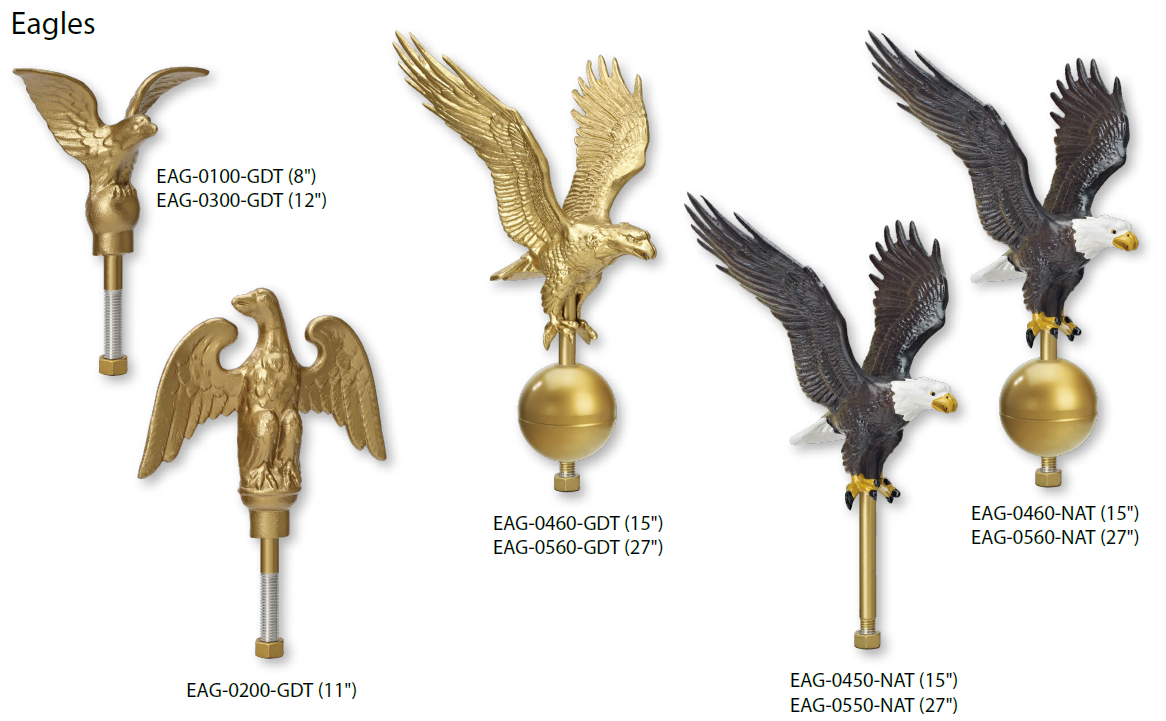 Various golden and gray eagle-shaped flagpoles with outstretched wings.