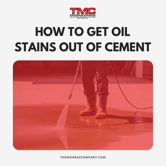 Person scrubbing oil stains off of driveway using bristled-brush, water, and proper cleaning agent