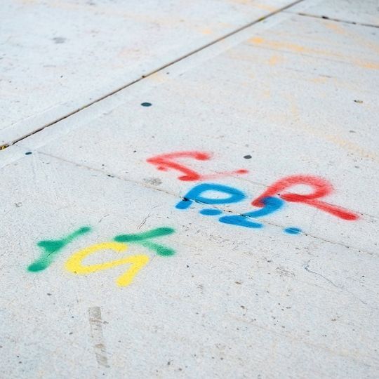 Multi-colored spray paint on concrete
