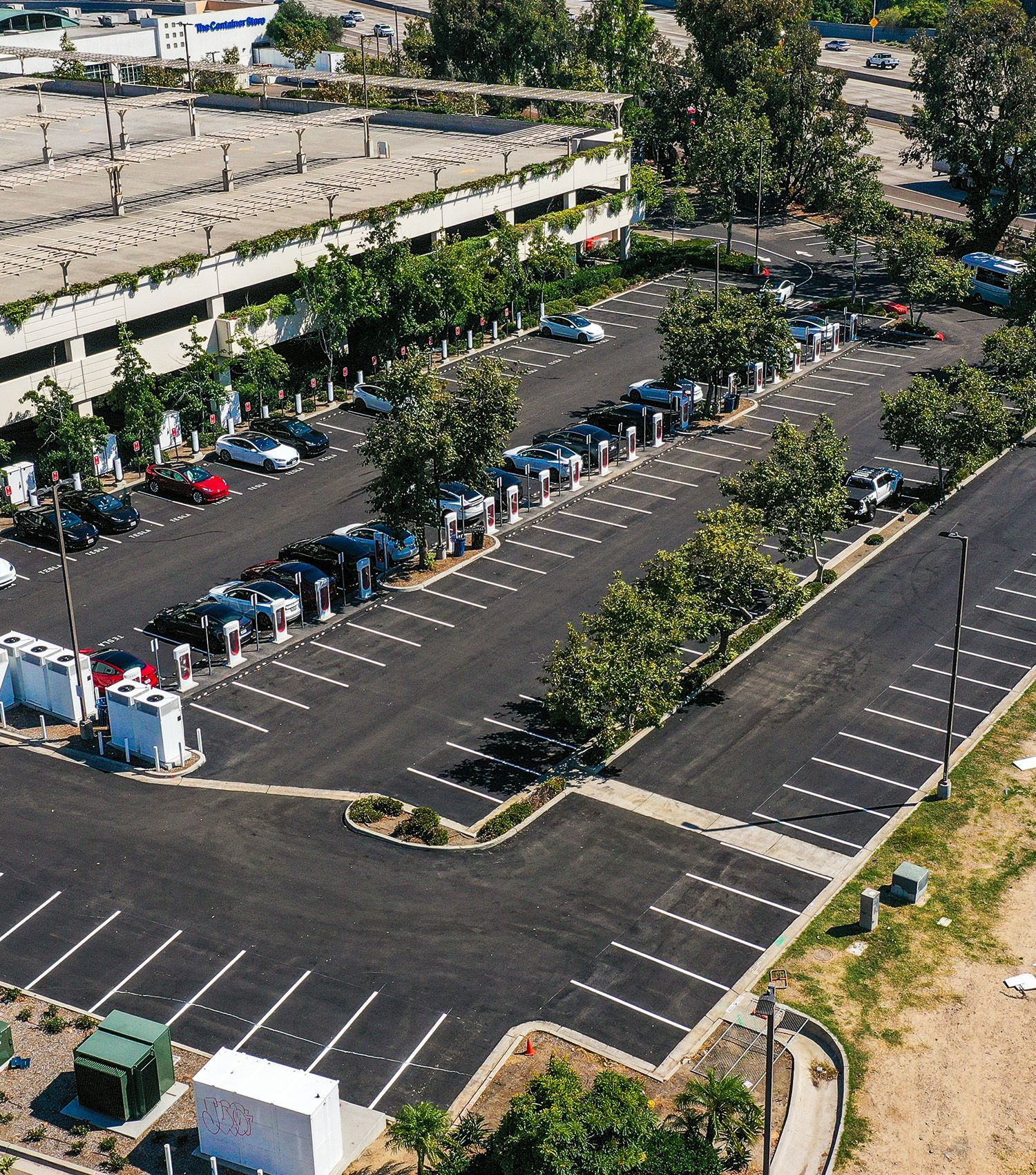 An aerial view of a parking lot at night