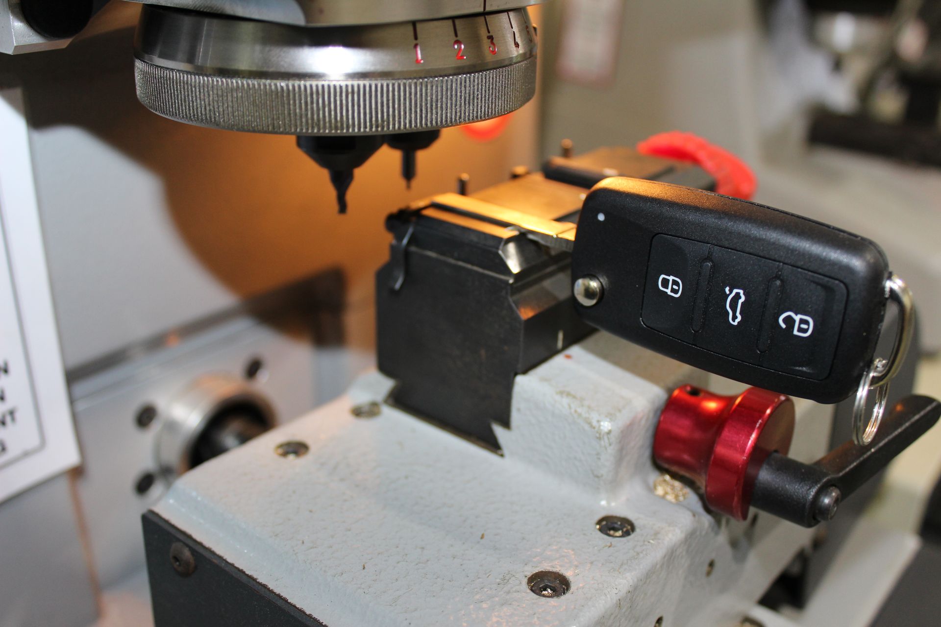 Car Key Being Cut — Locksmiths on the Sunshine Coast, QLD