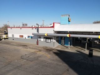 An aerial view of a fast food restaurant on a sunny day.