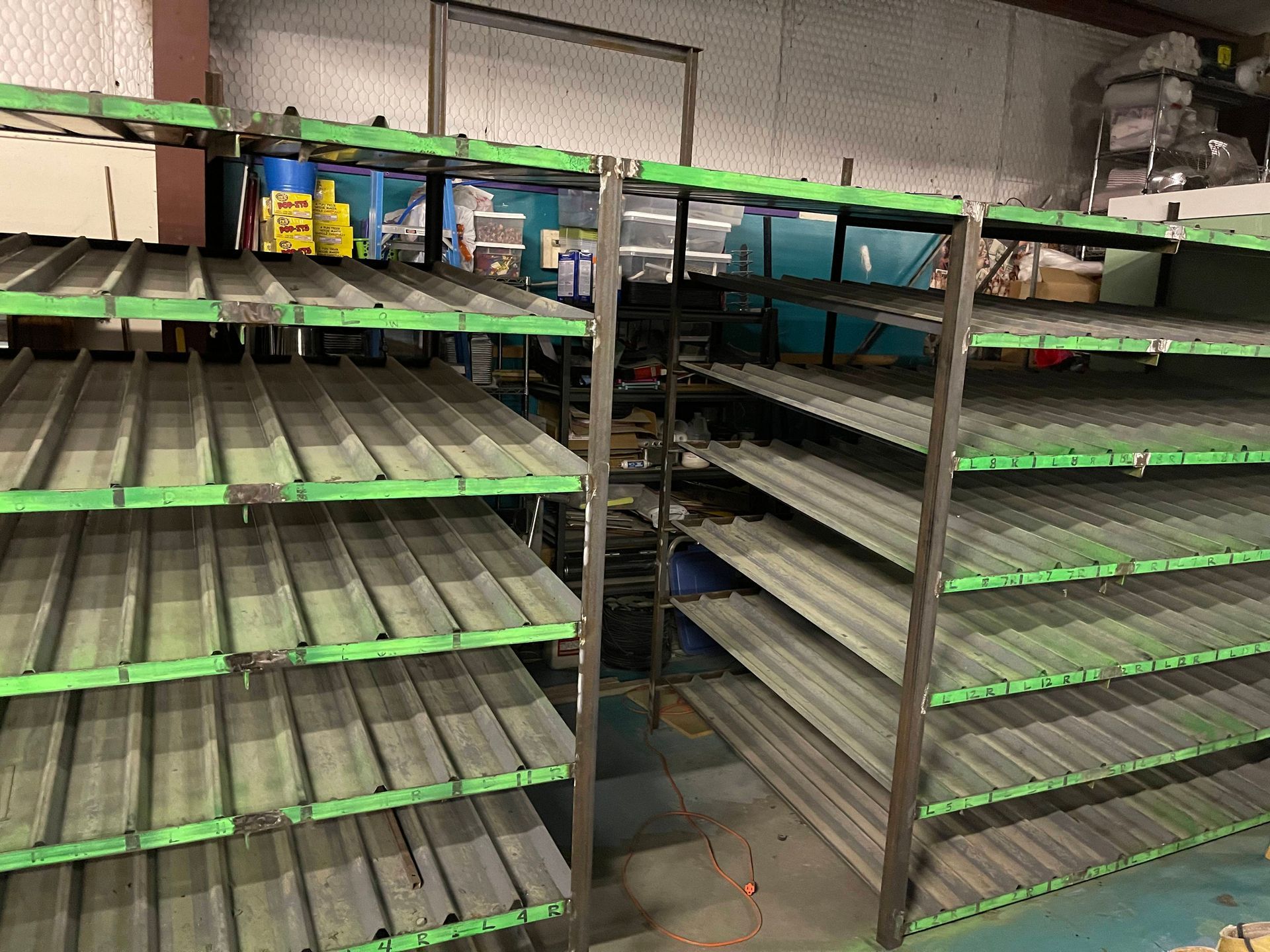 a warehouse filled with lots of empty shelves .