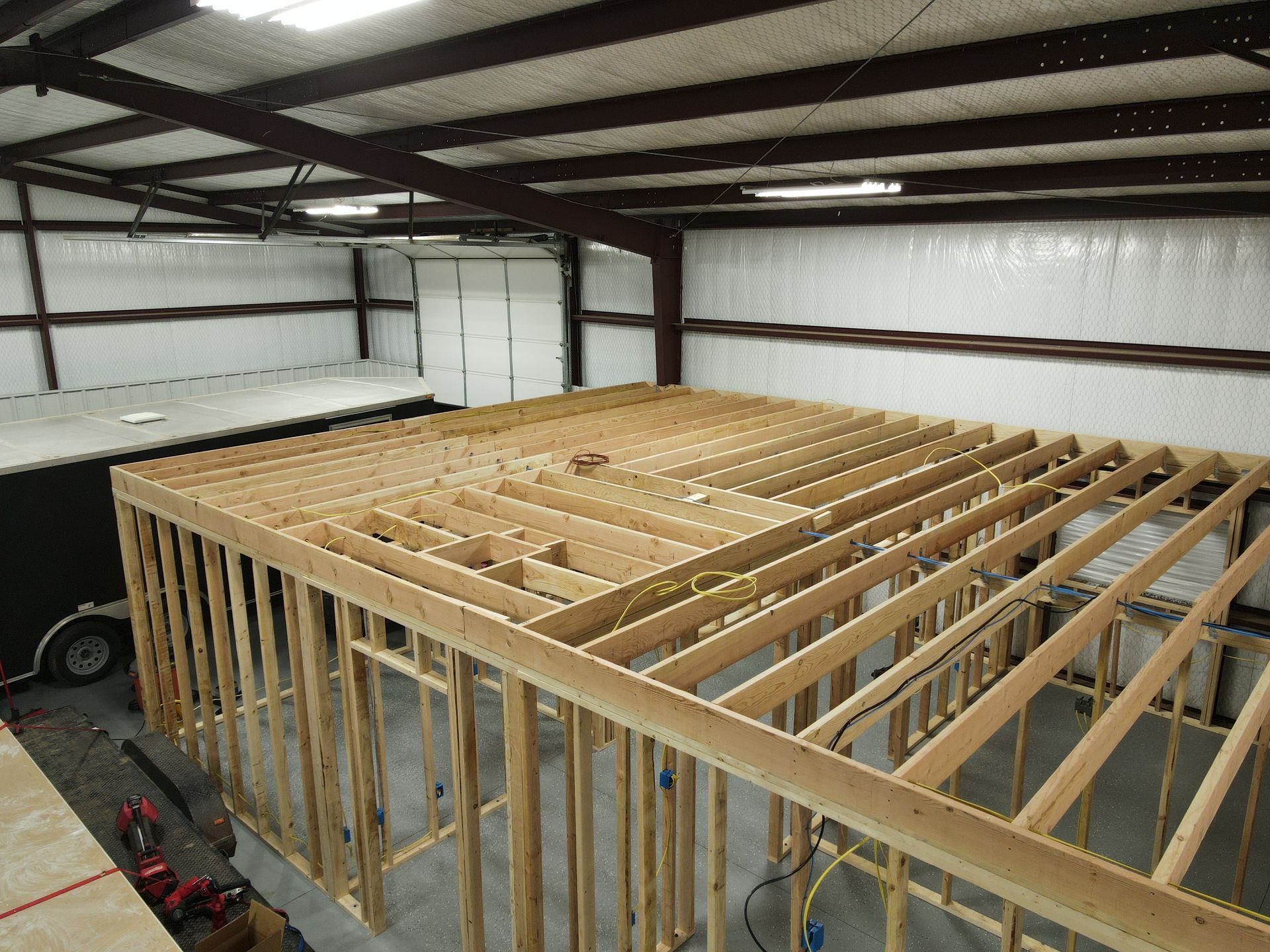 a large wooden structure is being built in a building .