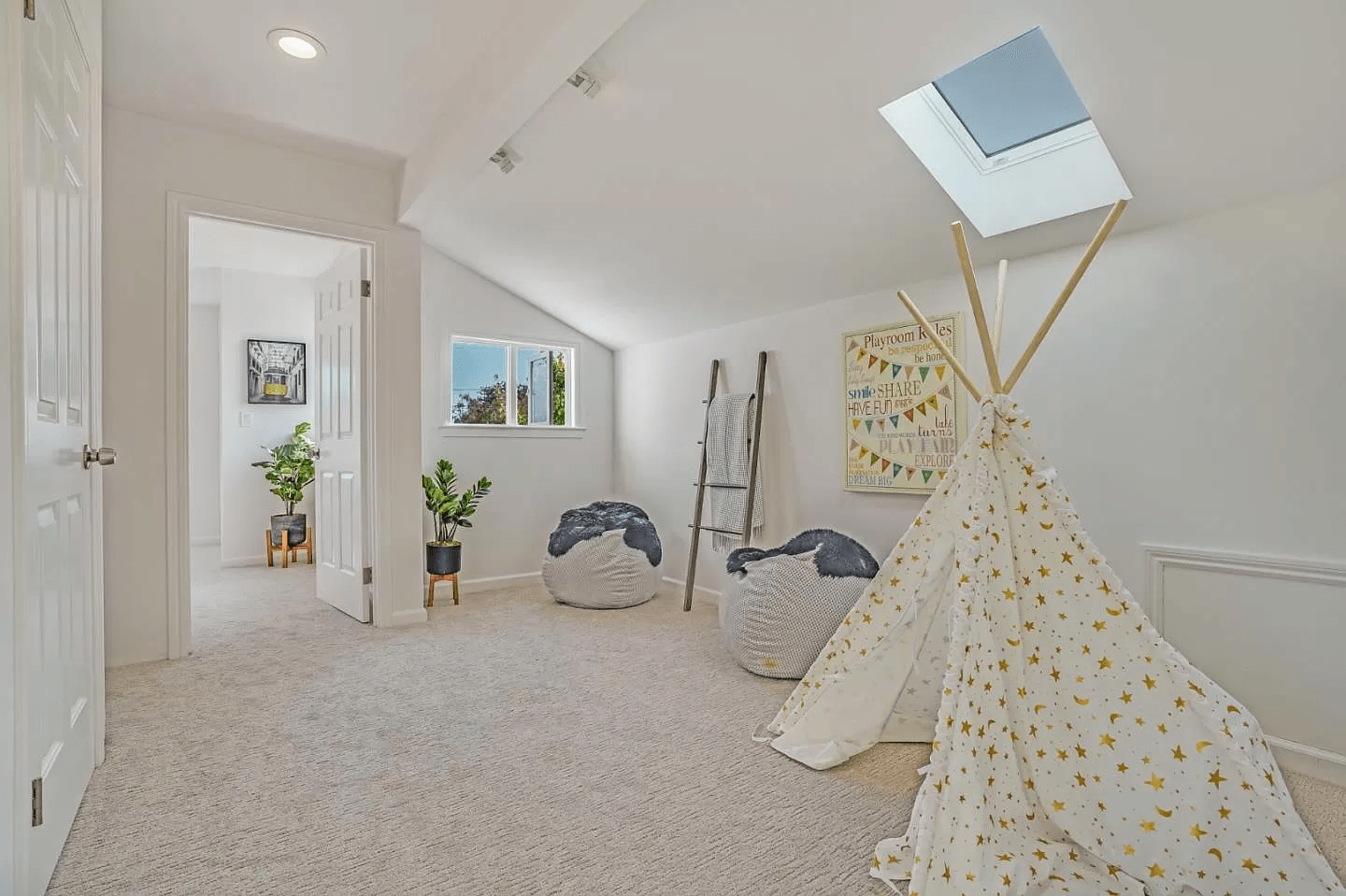 There is a teepee in the middle of the room.