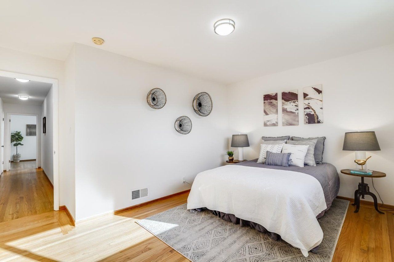 There is a large bed in the middle of the room.