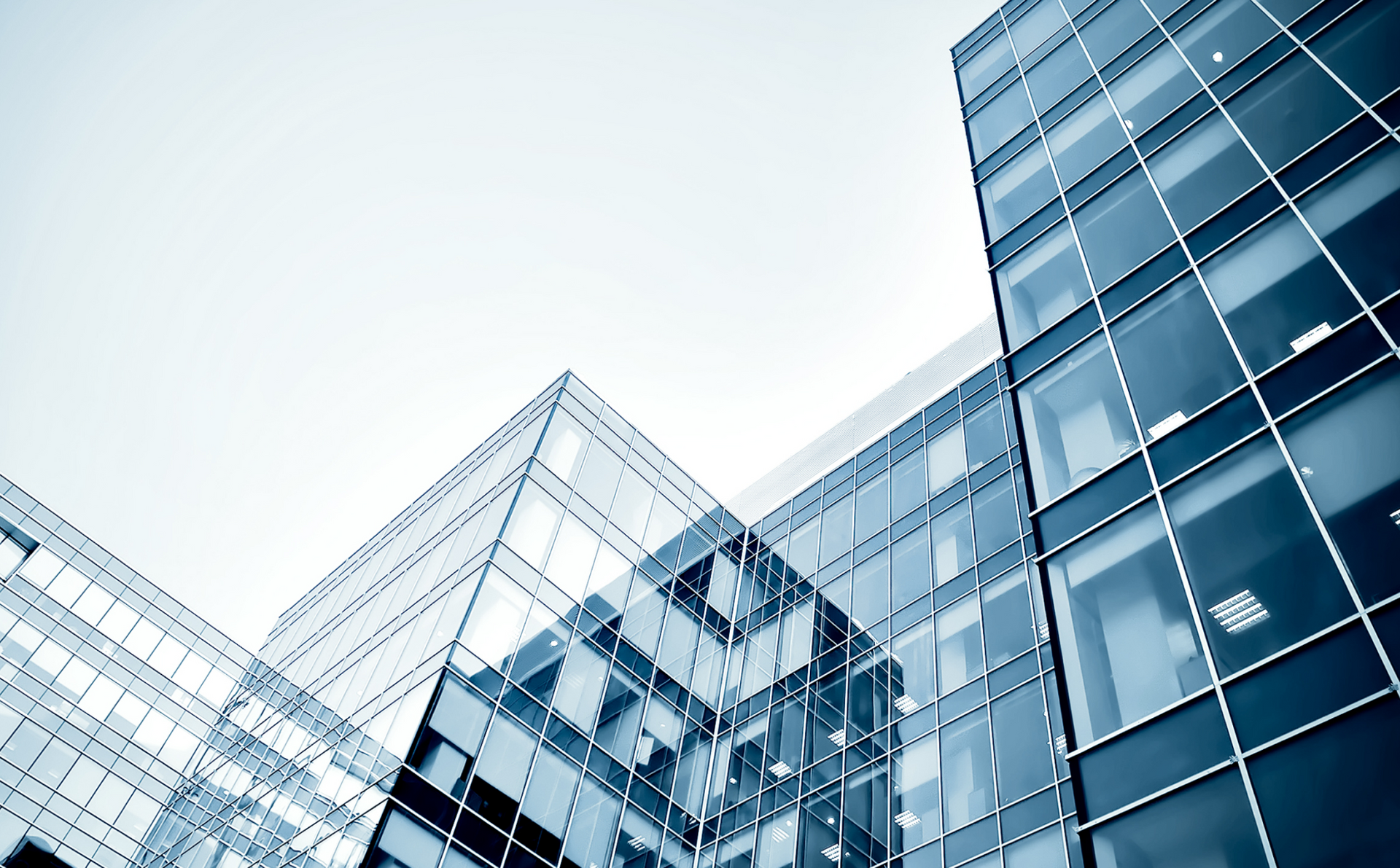 Looking up at a building with a lot of windows