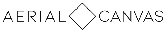 The logo for aerial canvas is black and white with a diamond in the middle.