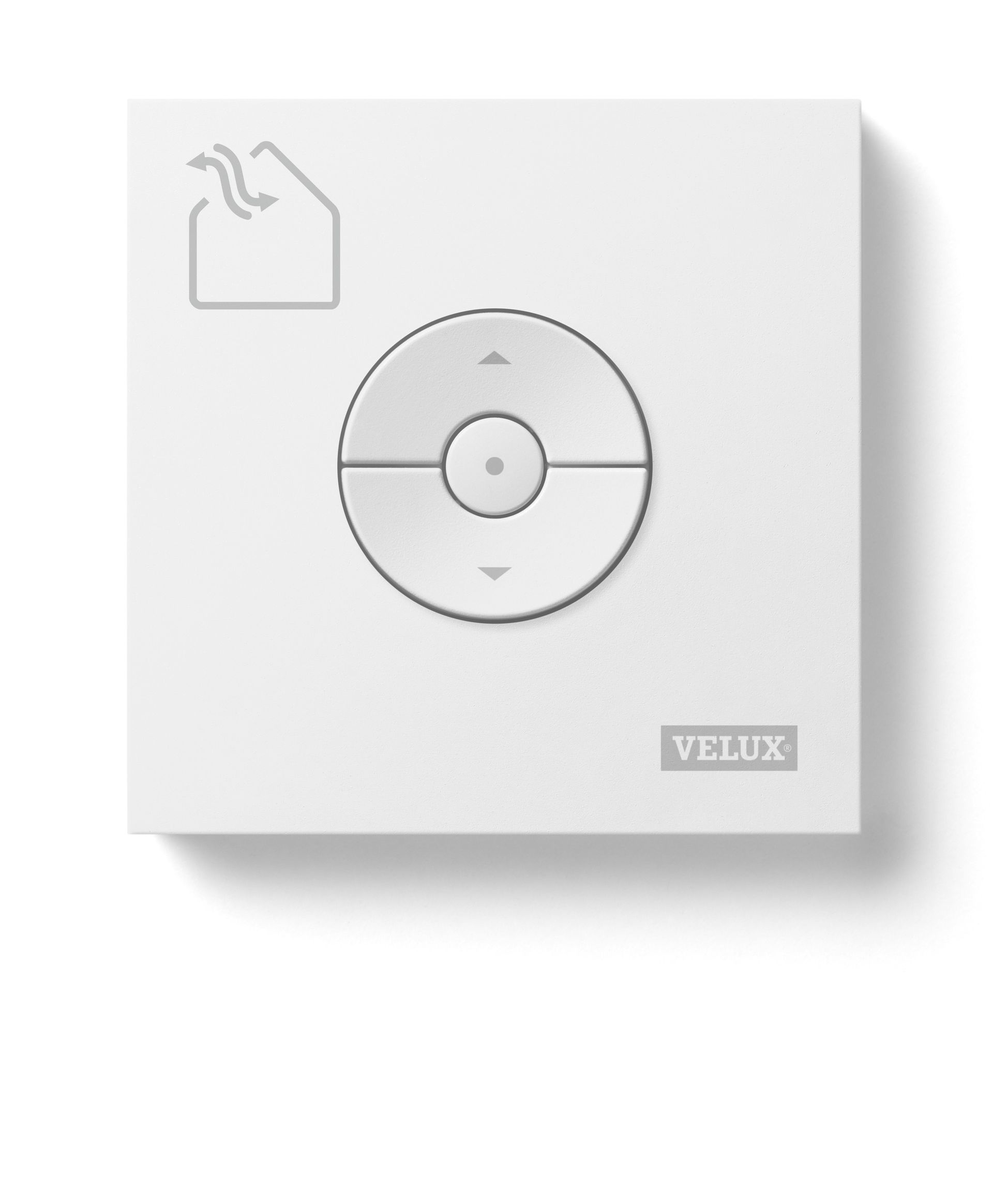 White VELUX control panel with circular directional buttons and roof icon.