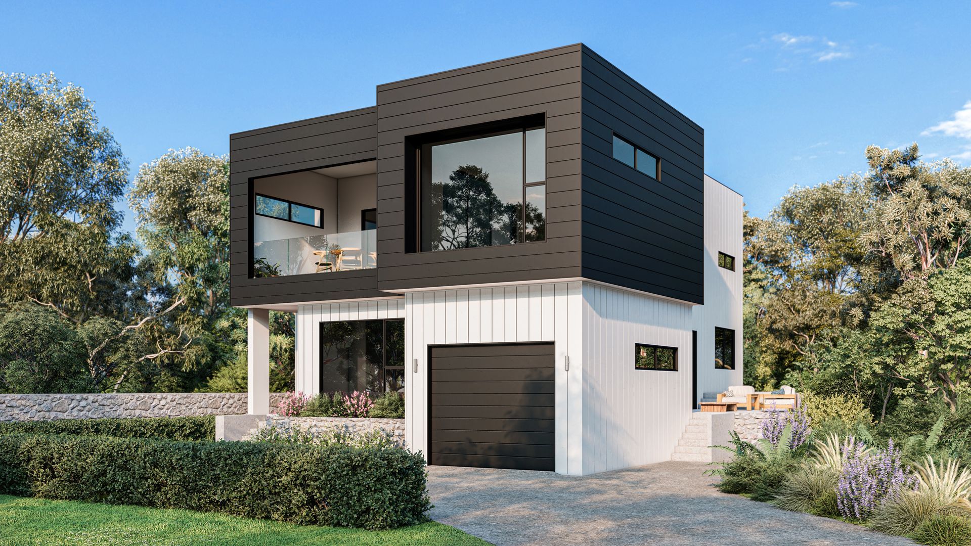 Modern two-story house with black upper level, white lower level, garage, and outdoor seating; driveway and greenery.